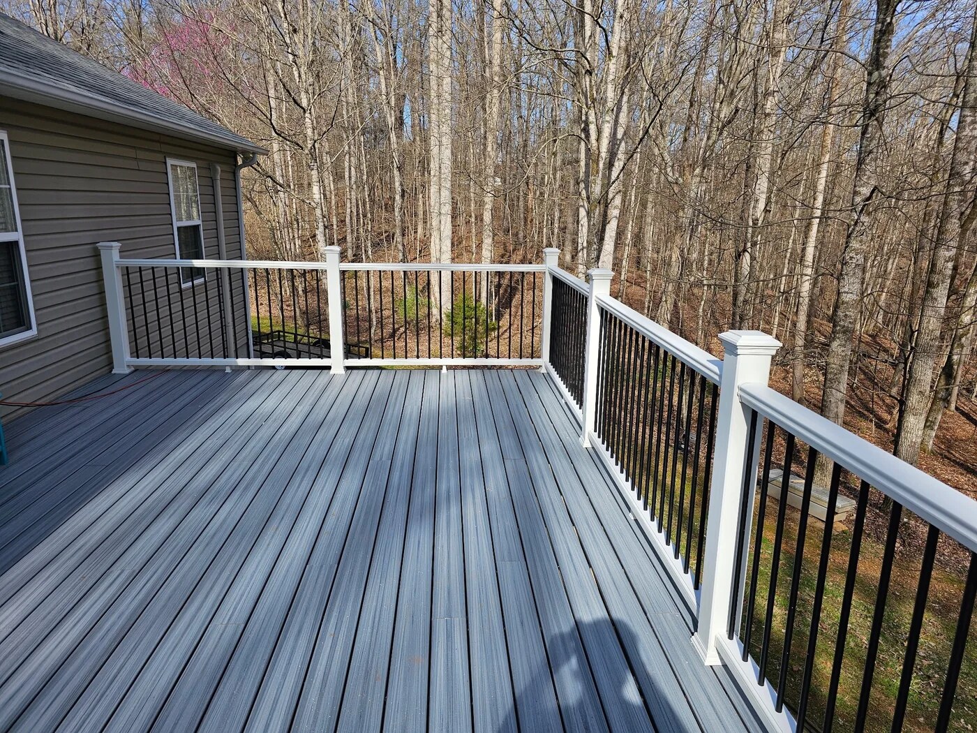 Composite deck with contrasting rail system